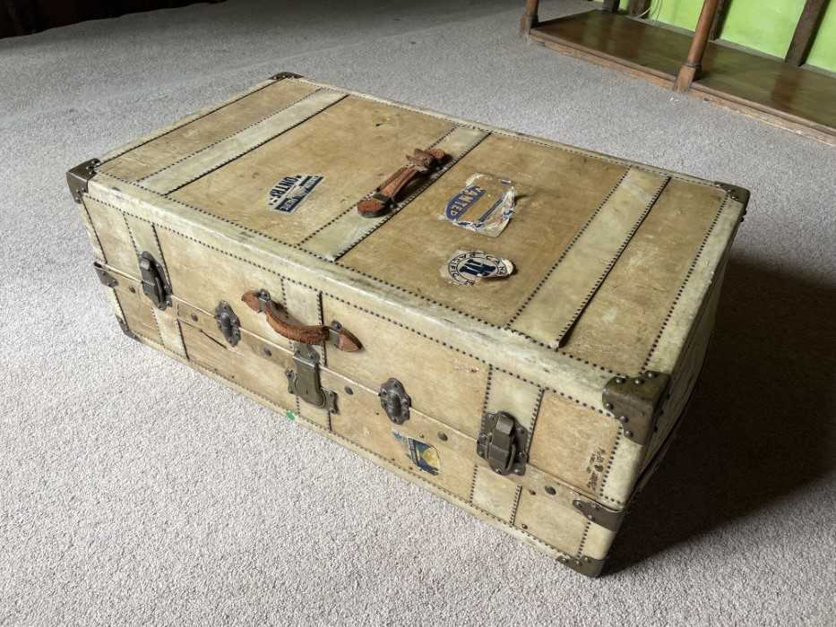 1920s velum cabin trunk with original fitted drawers enclosed by a tambour shutter, hanging rail and