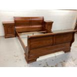 Contemporary cherrywood sleigh bed and matching bedside cabinets purchased from John Lewis