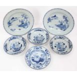 Four 18th Chinese export blue and white pudding bowls and two plates