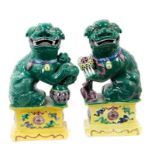 Pair Chinese Kangxi style polychrome dogs of foo