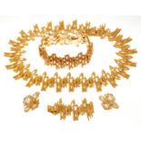 1970s Grima-style gilt metal suite of jewellery comprising necklace, bracelet and earrings