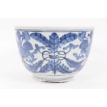 A Japanese blue and white porcelain bowl, Edo period, painted with a foliate pattern, 16cm high