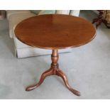 George III mahogany circular tilt top table on turned support and tripod base, 76cm diameter