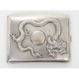 Late 19th/early 20th century Chinese white metal cigarette case, the cover with raised Dragon decora