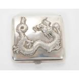 Late 19th/early 20th century Chinese silver cigarette case of shaped form, with raised Dragon decora