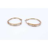 Pair of diamond hoop earrings with brilliant cut diamonds in 9ct yellow gold channel setting, estima