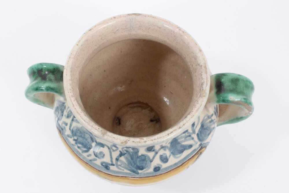 An unusual Italian maiolica twin-handled pot, with blank scrollwork cartouche, probably an apothecar - Image 3 of 4