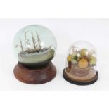 Victorian wax bowl of fruit, together with a ship diorama in a glass globe