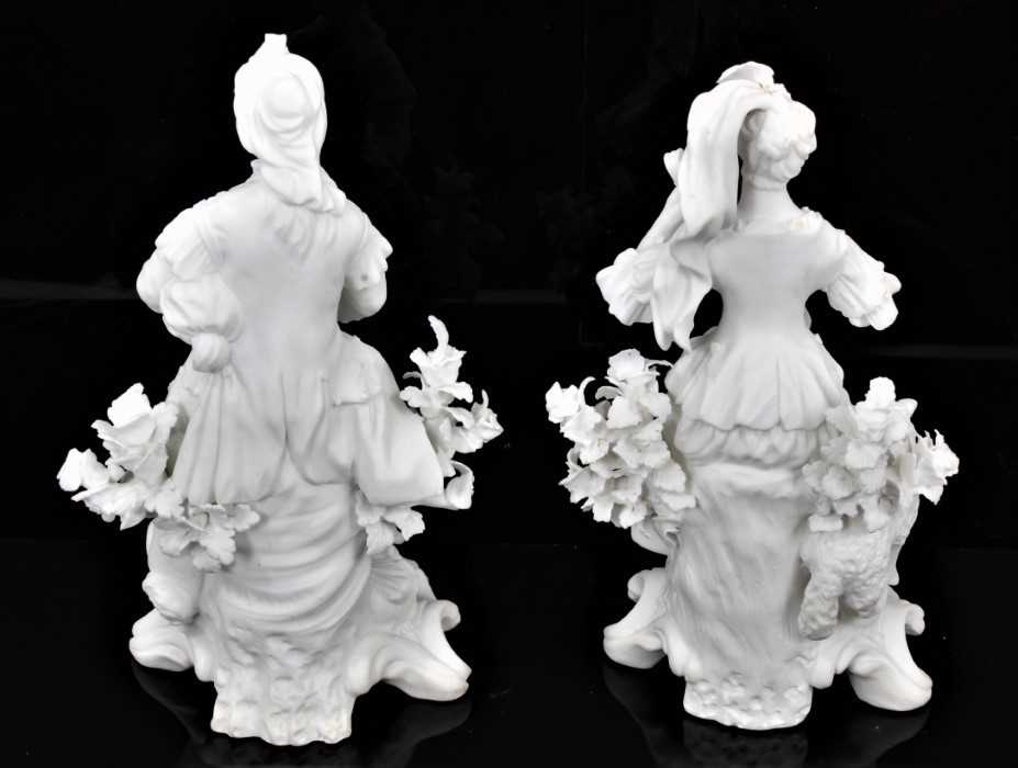 A pair of Derby bisque figures of a shepherd and shepherdess, shown seated on scrolled rococo bases, - Image 4 of 5