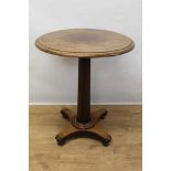 Early 19th century mahogany lamp table with circular top table standing on octagonal column and pla
