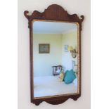 Late 19th century mahogany wall mirror in the Georgian style, with arched shaped cresting and gilt s