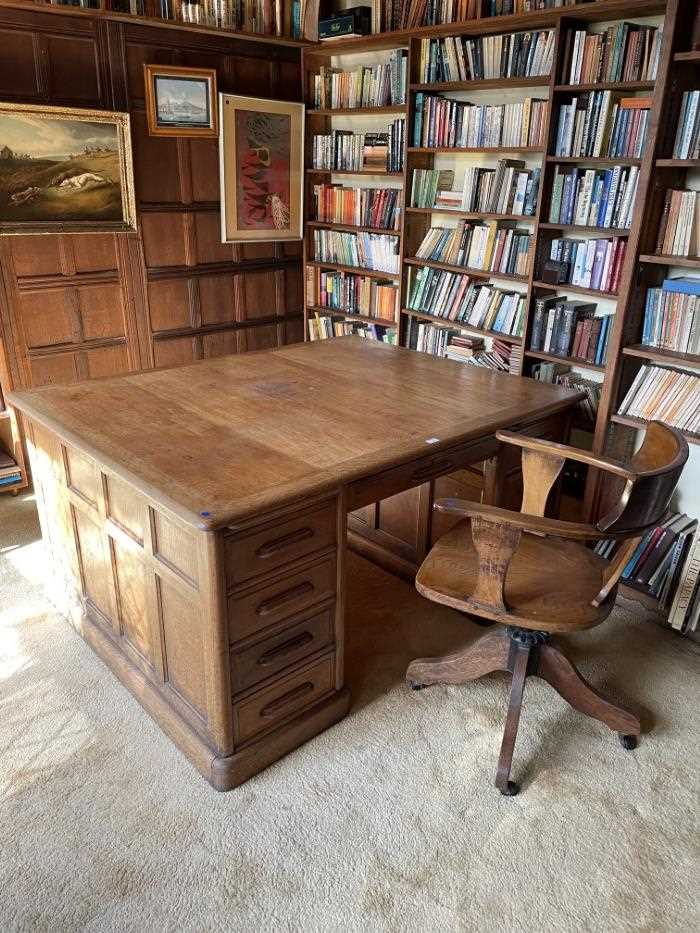 1920s oak pedestal writing desk and revolving desk chair