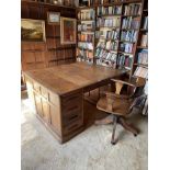 1920s oak pedestal writing desk and revolving desk chair