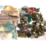 Collection of banknotes, coins, military badges and buttons