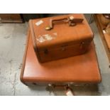 Two Samsonite leather cases.