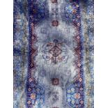 Part silk runner with bird and floral decoration on blue ground, 195cm x 58cm