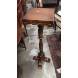 Old Charm oak plant stand, 93cm high, together with another plant stand, 90.5cm high and an occasion
