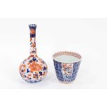 An 18th century Chinese Imari beaker, and a Japanese Imari bottle vase