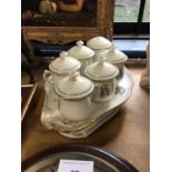 French porcelain six-person custard cup set, on stand, marks to bases