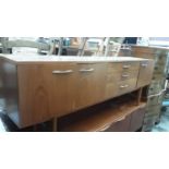 Mid 20th century teak sideboard, possibly G-Plan with three drawers and three cupboard doors, 203.5c