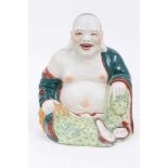 20th century Chinese porcelain figure of Buddha seated with polychrome decoration, impressed seal ma