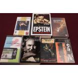 Three boxes of music related books including Beatles, John Lennon, Eric Clapton etc, also VHS video