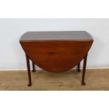 George II style mahogany drop leaf dining table, the oval hinged top on turned legs and pad feet, 15