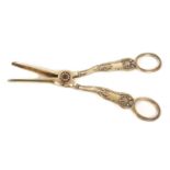 A pair of silver gilt grape scissors, Howe crest