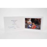 H.M.Queen Elizabeth II and H.R.H. The Duke of Edinburgh, signed 2003 Christmas card with twin gilt c