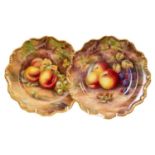 A pair of Royal Worcester plates painted with fruit, signed by H.H. Price, 22.5cm across