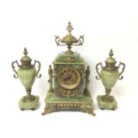 Late 19th century onyx mantel clock garniture