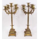 Pair of classical revival brass candelabrum