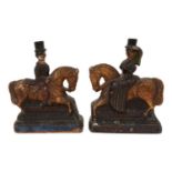 Pair of folk art carved wood Victoria and Albert on horseback, c.1850, with original paint