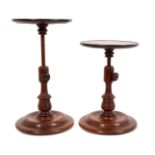 Pair of good quality 19th century turned mahogany adjustable circular display stands with side screw