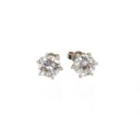 Pair of diamond single stone earrings