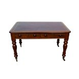 Victorian mahogany library table, with tooled red leather top and two frieze drawers on turned legs
