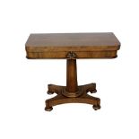 Regency mahogany card table, the rounded rectangular fold over top with green inset baize and well b