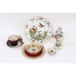 Two 19th century Paris cups and saucers, a Samson moulded plate decorated with birds, a Samson figur
