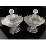 Pair of Regency cut glass urns and covers