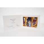 H.M.Queen Elizabeth II and H.R.H. The Duke of Edinburgh, signed 2002 Christmas card with twin gilt c