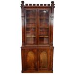 19th century Gothic mahogany two height bookcase, with crenellated cornice and open adjustable shelv