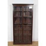 19th century mahogany floorstanding bookcase, with pair of glazed doors on plinth base, 89cm wide x