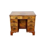 Early 18th century and later walnut desk