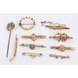 Group of Victorian and Edwardian gold bar brooches and horseshoe stick pin