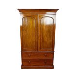 Victorian flame mahogany twin wardrobe, with moulded cornice and enclosed by a pair of arch panel do