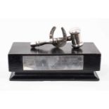 Racing trophy in the form of a gavel and horseshoe, white metal, mounted on an ebonised plinth with