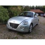 2007 Daihatsu Copen 1,298cc, 2 door roadster, finished in silver with optional red leather interior,