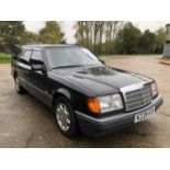 1993 Mercedes - Benz 320TE W124, Automatic, finished in metallic grey with a black leather interior,