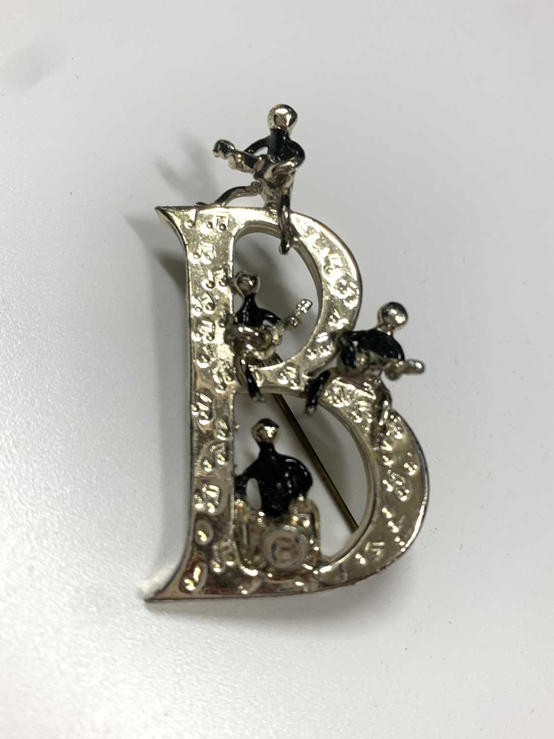 1960s Beatles brooch by Exquisite, the larger capital B decorated with musical notes