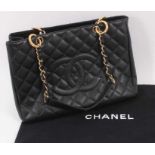 Chanel black caviar quilted leather large shopping tote handbag.